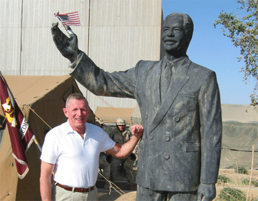 schrock-saddam-statue.gif